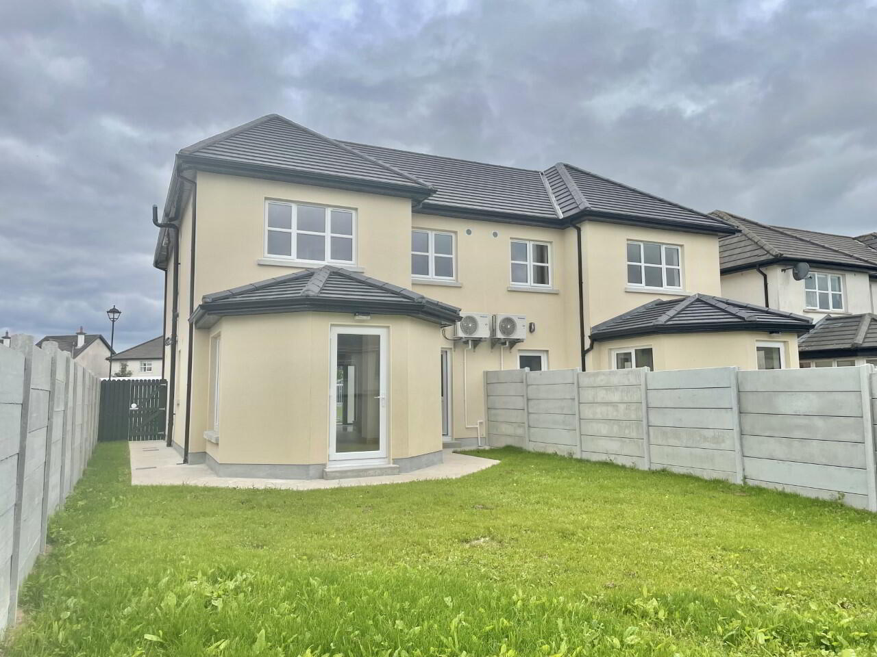 photo of the rear back garden of a completed house in the Mills Housing Development