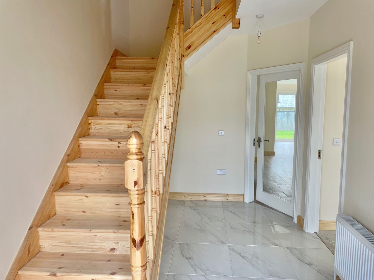 photo of the staircase inside a house in the Mills Housing Development