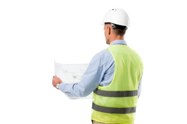 image of a construction worker looking at drawings and plans for a building project